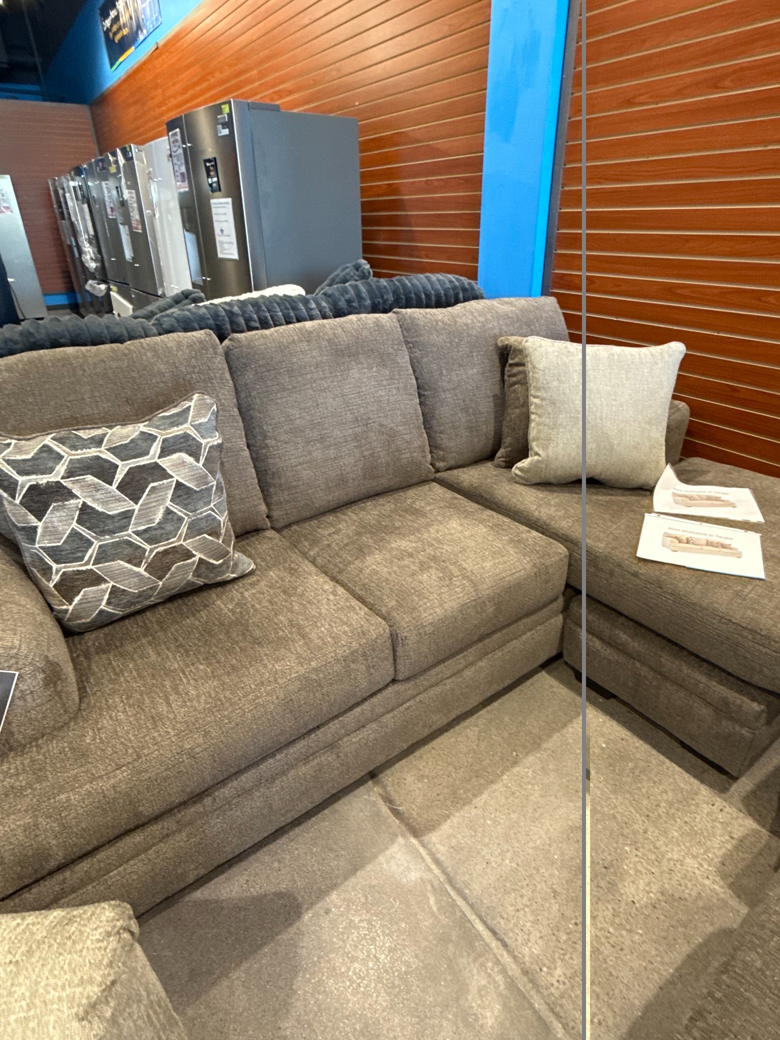 Ashley sofa with chaise in our showroom